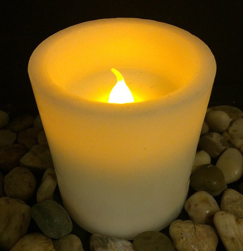 The "flame" of a flameless candle is an LED bulb inside a flame-shaped piece of plastic
